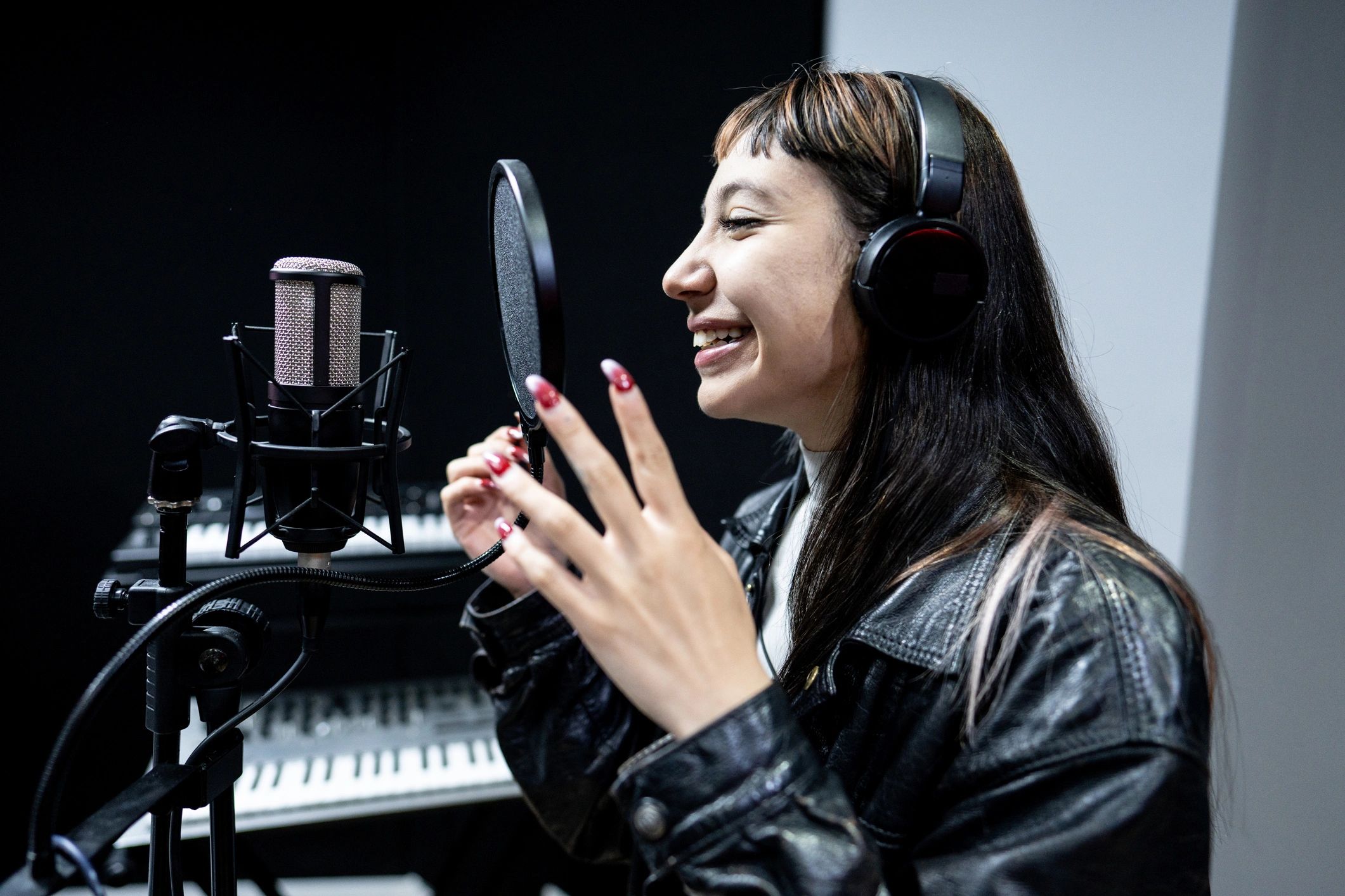 Artist in a recording studio representing creative leadership